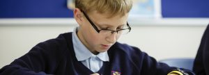 boy wearing glasses