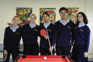 children ready to play table tennis and snooker