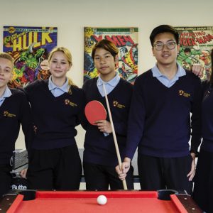 children ready to play table tennis and snooker