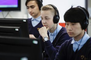 children wearing headsets