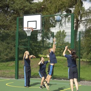 Students playing basketball