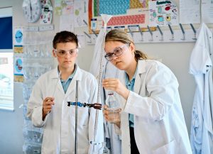 children carrying out an experiment