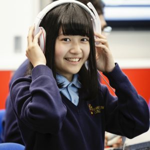 girl wearing headphones