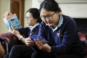 Girls Playing Cards