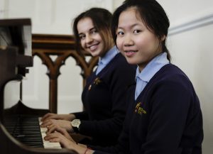 Girls Playing Piano
