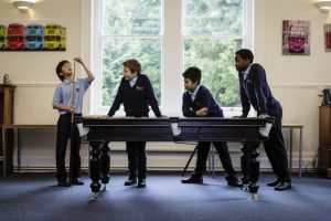 Snooker being played in the common room