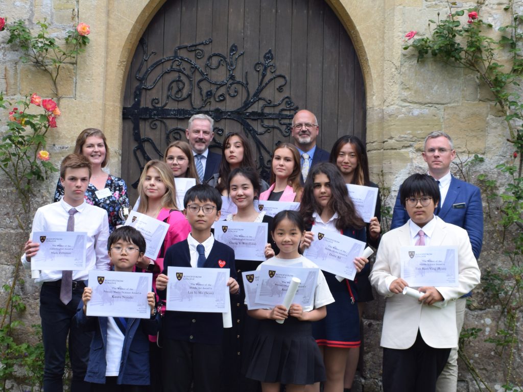 Group of children holding certificates